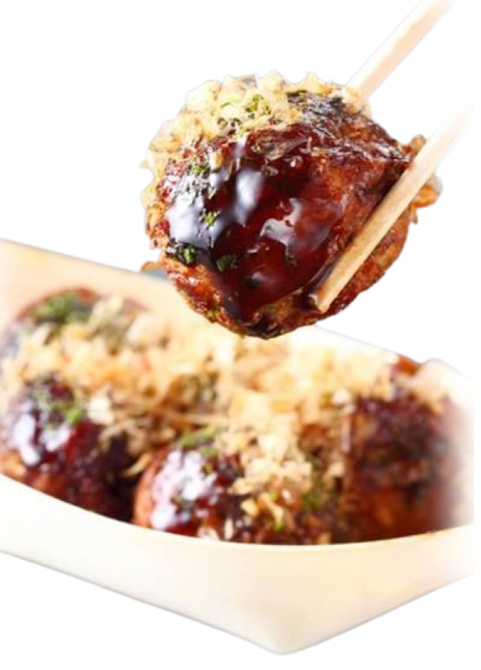 箸でたこ焼きを持ち上げている写真